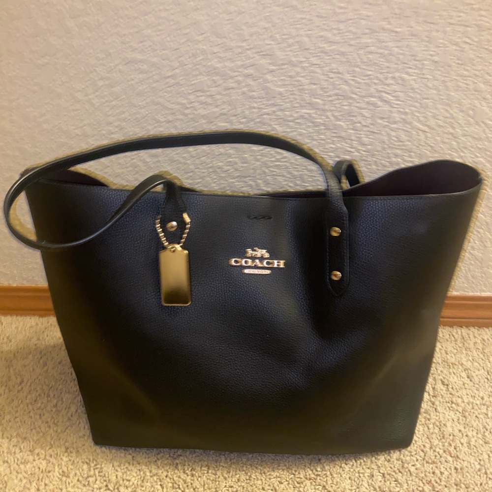 Black leather Coach Tote. New, never used! Authentic. Perfect condition.